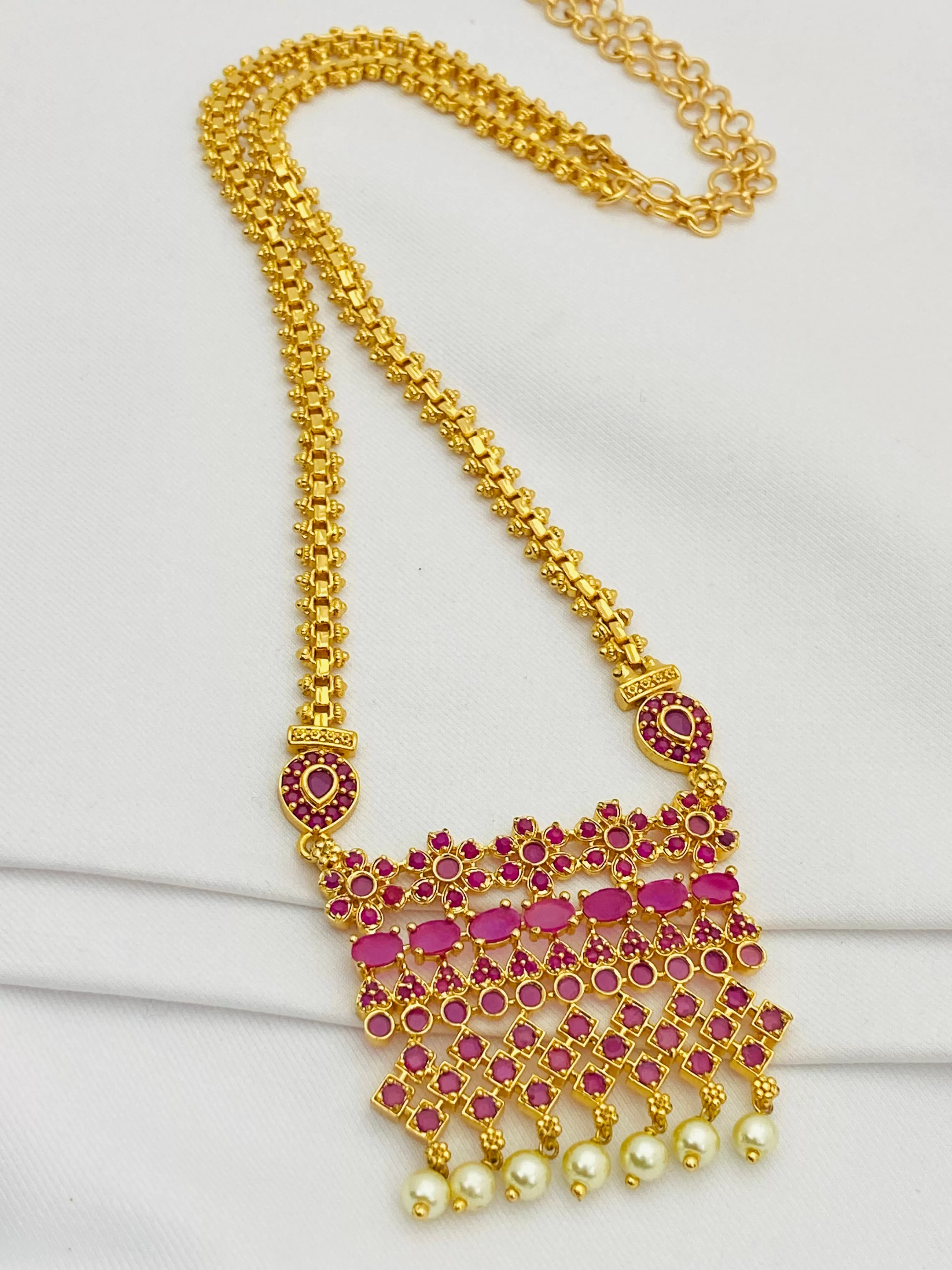 Stunning Ruby Colored Long Chain With Pearl Drops