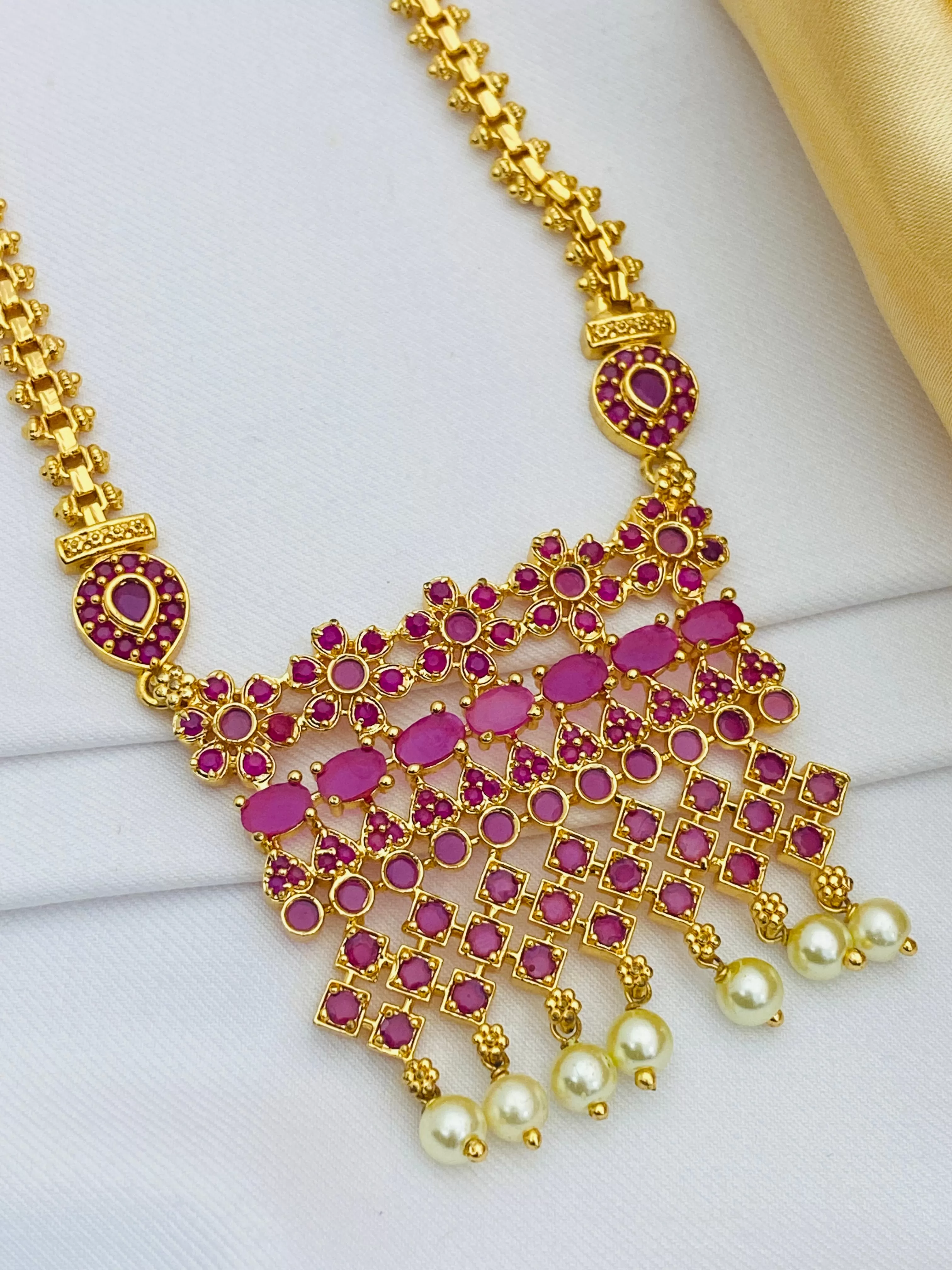 Stunning Ruby Colored Long Chain With Pearl Drops