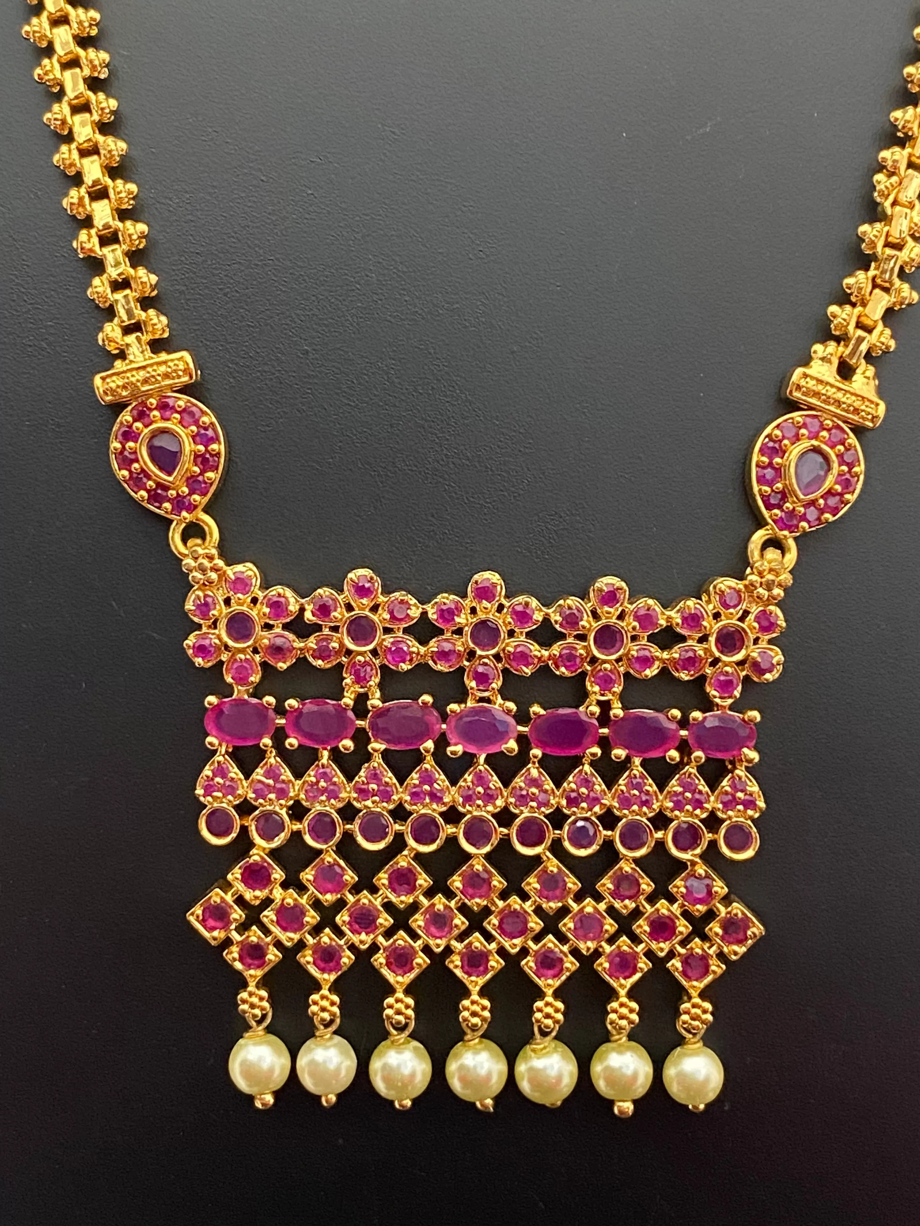 Stunning Ruby Colored Long Chain With Pearl Drops