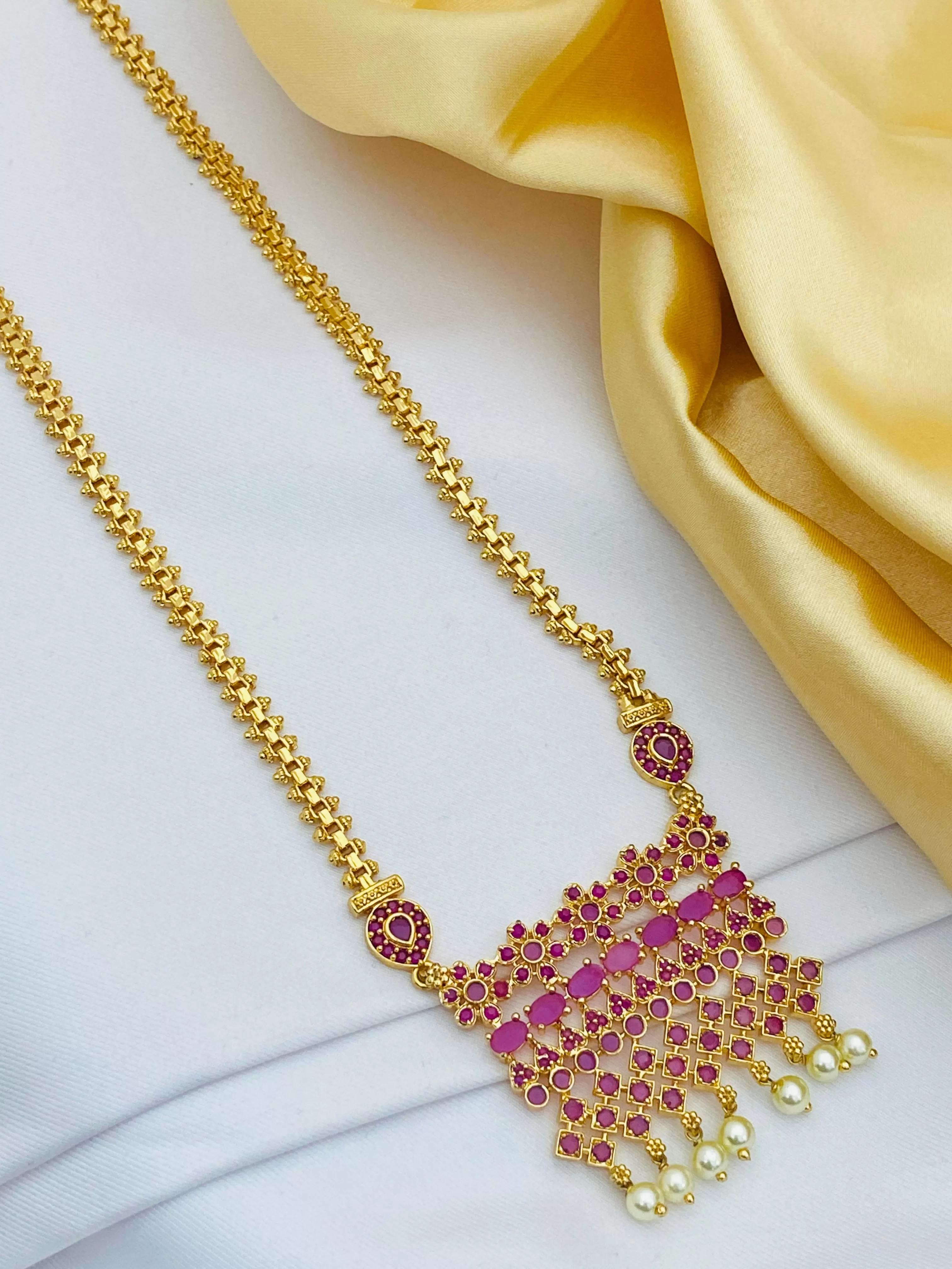 Stunning Ruby Colored Long Chain With Pearl Drops